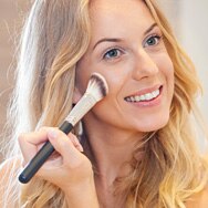 Touching up Sunscreen over Makeup